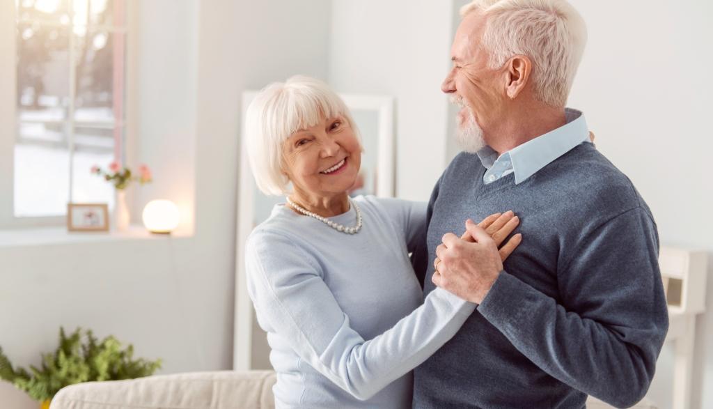 happy couple managing pension and aged care 